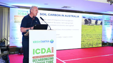 Dr Michael Crawford presents at the ICDA conference in India.