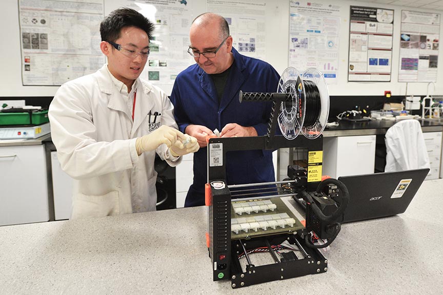 Soil CRC PhD student Reuben Mah working in the laboratory