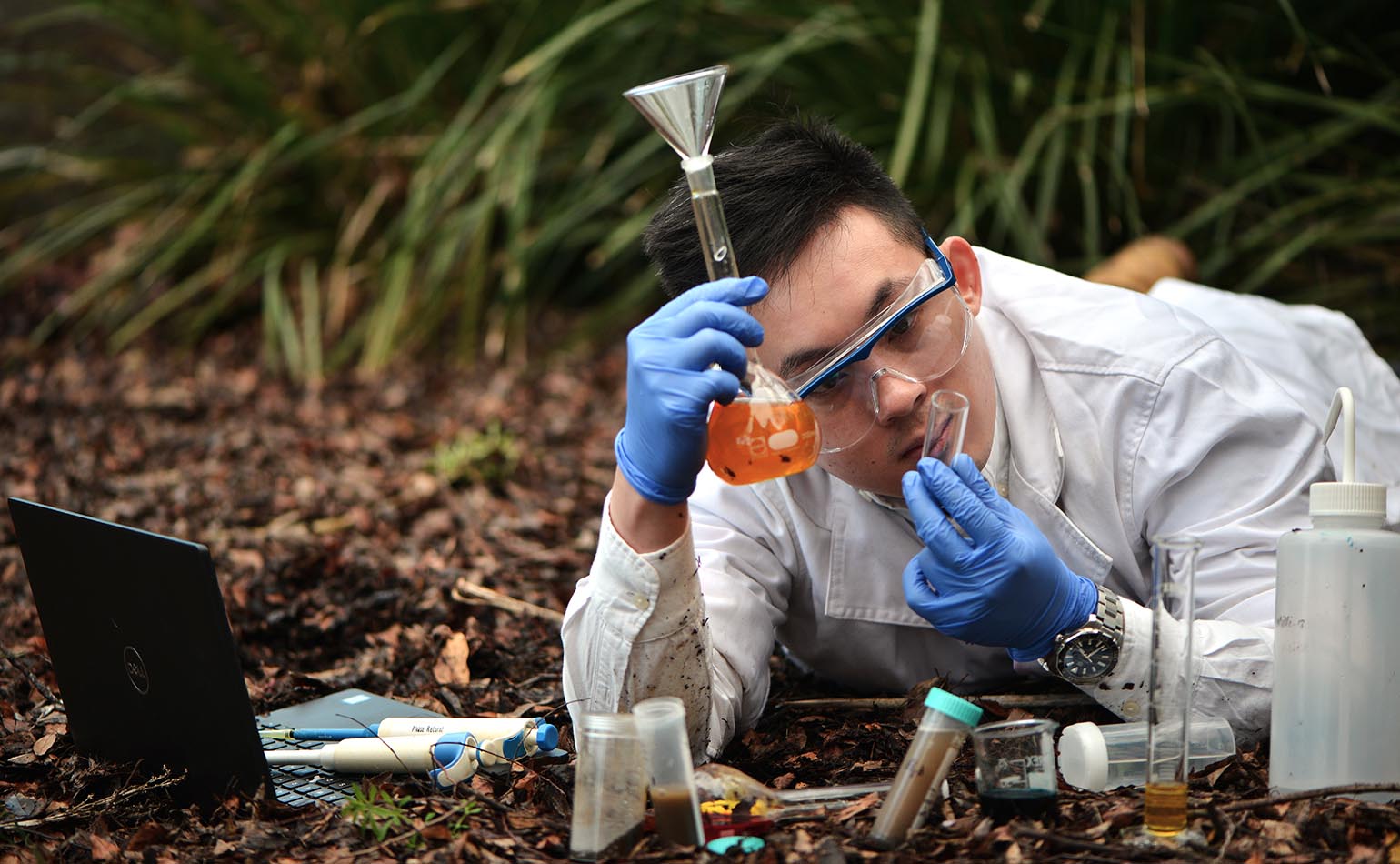 Soil CRC PhD student Reuben Mah in the field